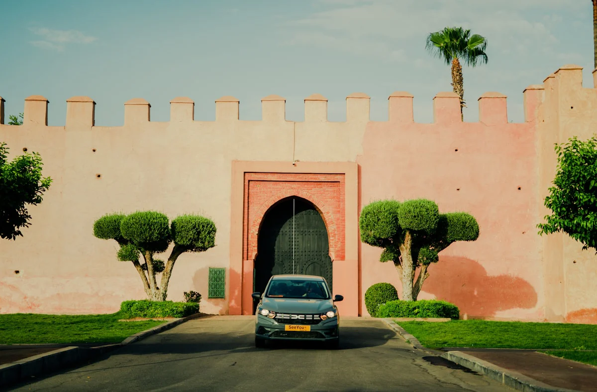 A car drives into an entrance.