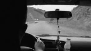 a view from inside a car of a mountain road