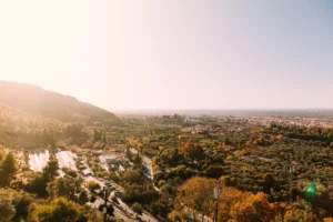 a view of a city from a hill