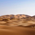 brown desert under blue sky during daytime