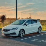 white honda sedan on road during daytime