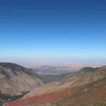 mountain range under clear blue sky