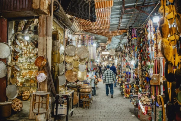 Bustling marketplace filled with various goods and shoppers