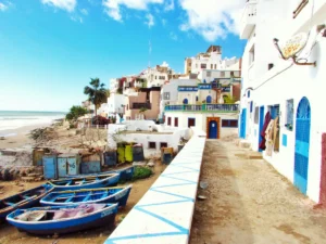 boatd docked near houses and body of water